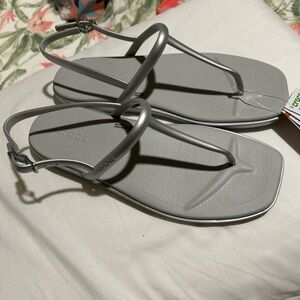 CROCS Women's Minimalist T-Strap Sandals in Light Gray